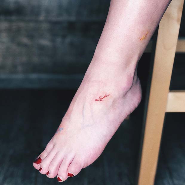 Cute and Tiny Fish Tattoo Design