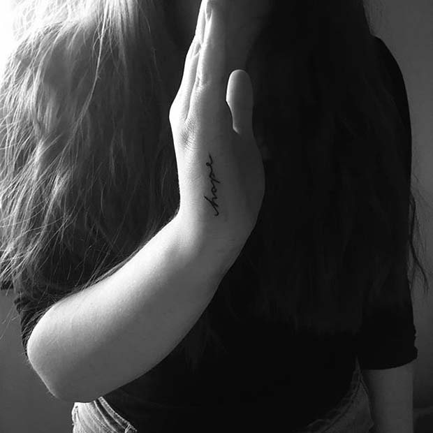 Quote Hand Tattoo Idea for Women