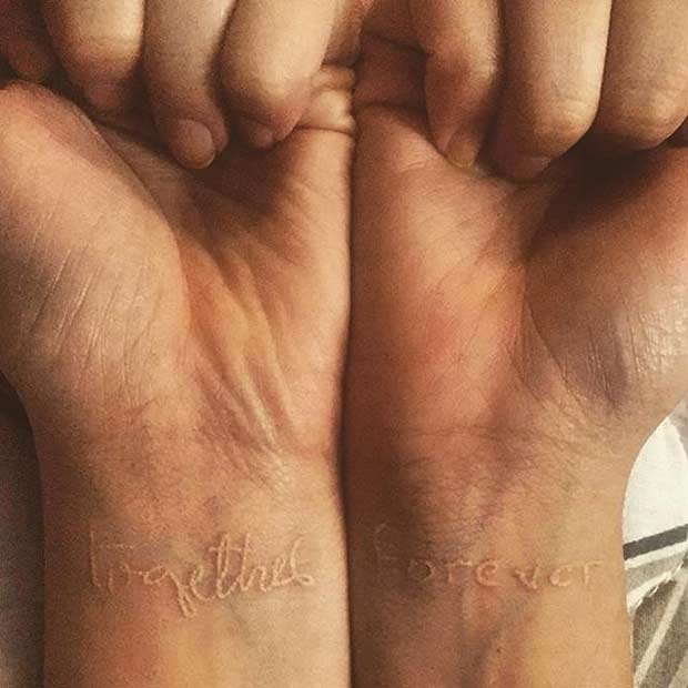 White Ink Wrist Connecting Tattoos