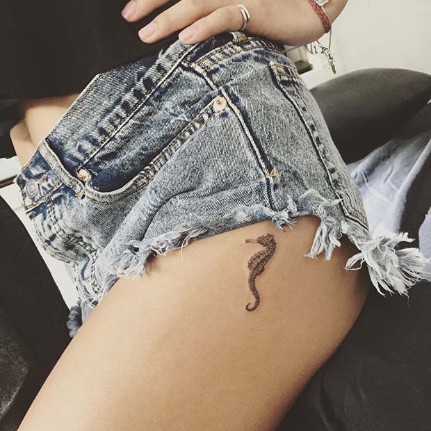 Small Seahorse Thigh Tattoo Idea for Women