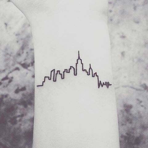 Small Skyline Tattoo Idea for Women