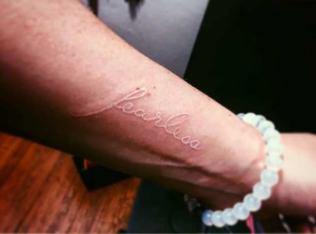 White Ink Fearless Tattoo Idea