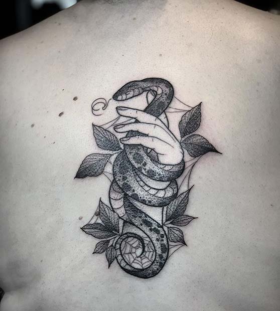 Snake with a Hand Back Tattoo