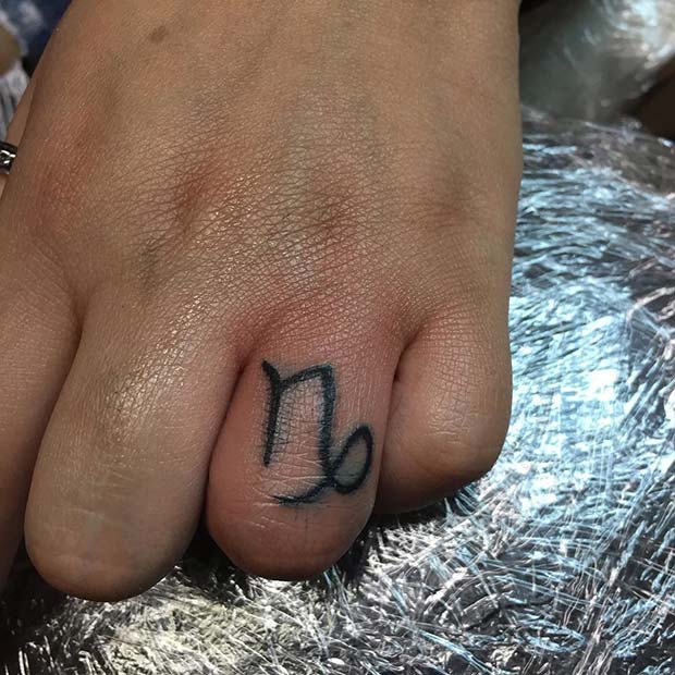 Star Sign Design Finger Tattoo