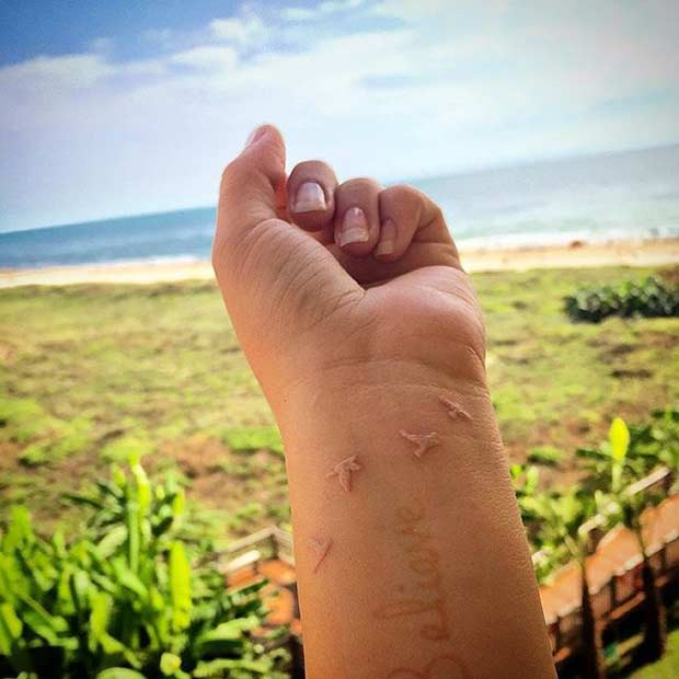 White Ink Wrist Tattoo