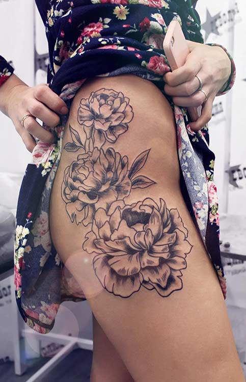 Side Thigh Flower Tattoo Idea for Women