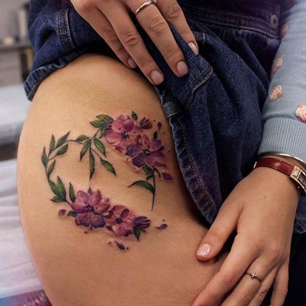 Upper Side Thigh Flower Tattoo Idea for Women