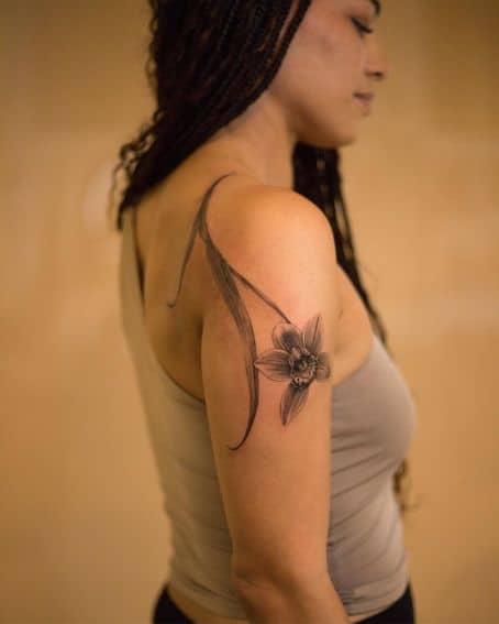 A Large Orchid Tattoo with a Leaf