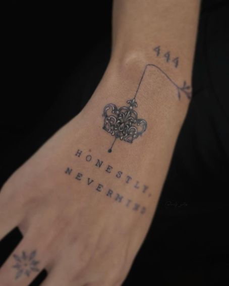 A Small Crown Tattoo on the Hand