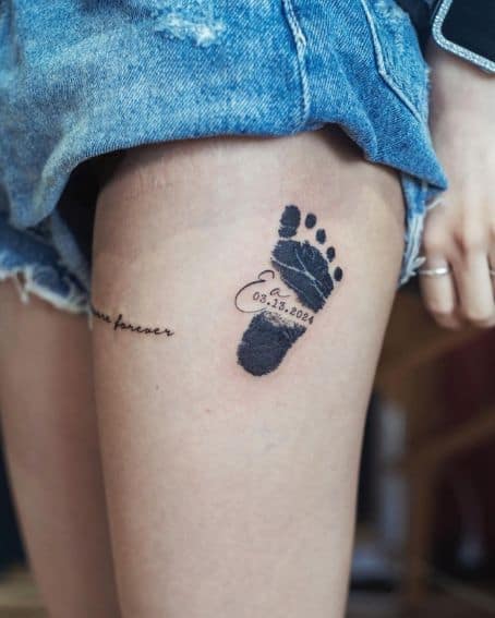 Baby Footprint Tattoo on Thigh