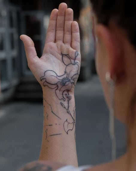 Beautiful Magnolia Flower Tattoo on Hand
