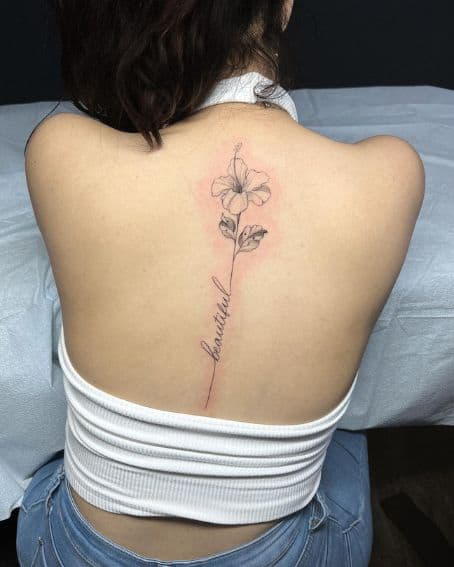 Beautiful Word and Hibiscus Tattoo on Back