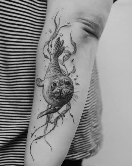 Big Diving Seal Tattoo Design