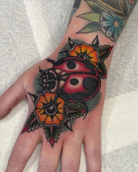 Big Ladybug Tattoo on Back Hand