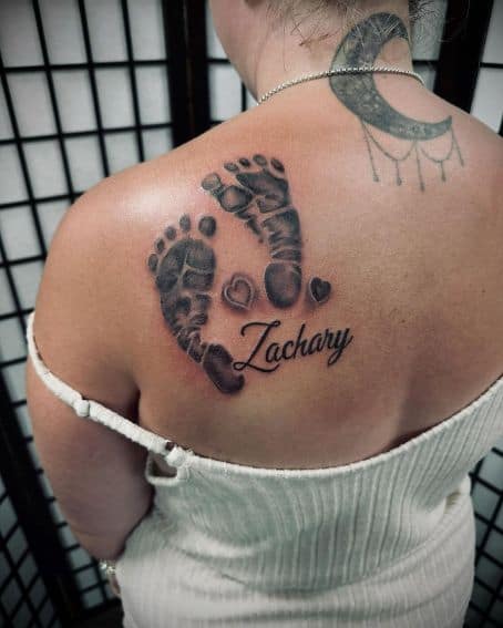 Black and Grey Footprint Tattoo on Back Shoulder