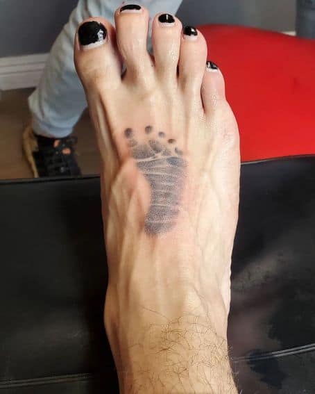 Black and Grey Footprint Tattoo on Foot