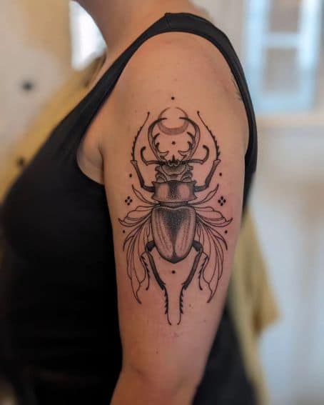 Black Work Beetle Tattoo