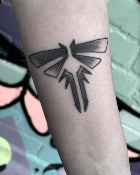 Black Work Firefly Tattoo on Arm
