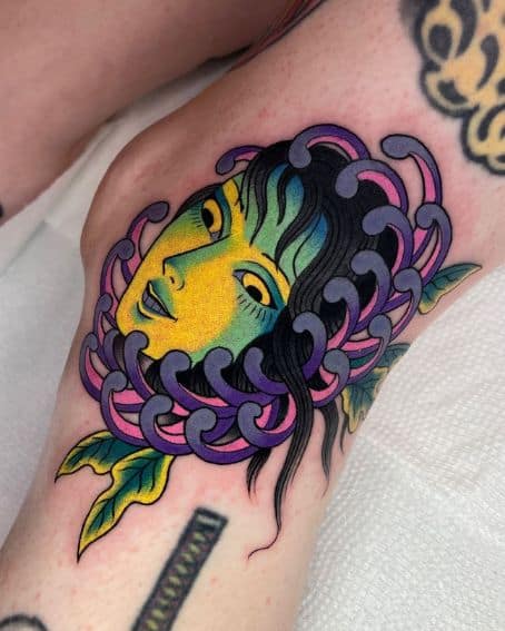 Blue and Green Chrysanthemum Tattoo with Face