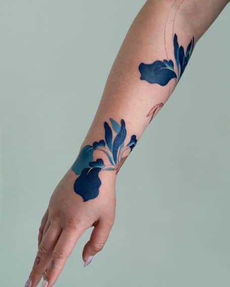 Bright Blue Iris Tattoo on Arm