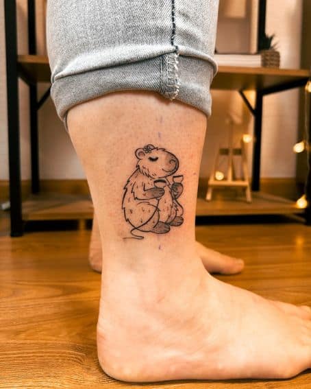 Capybara Holding Ultrasound Probes Tattoo