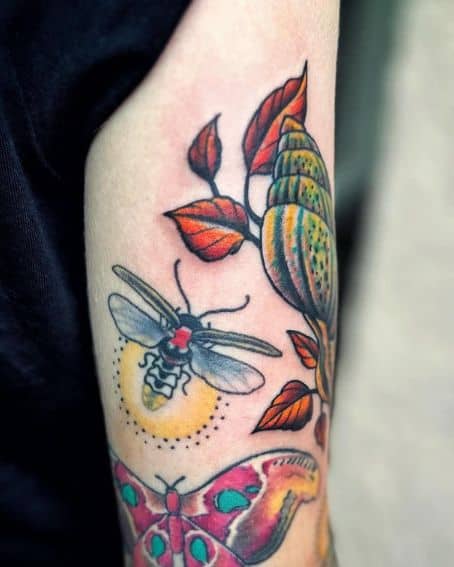 Colorful Firefly Tattoo on Elbow