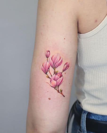 Colorful Magnolias Tattoo on Back Arm