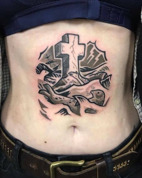Cross and Seal Tattoo on Stomach