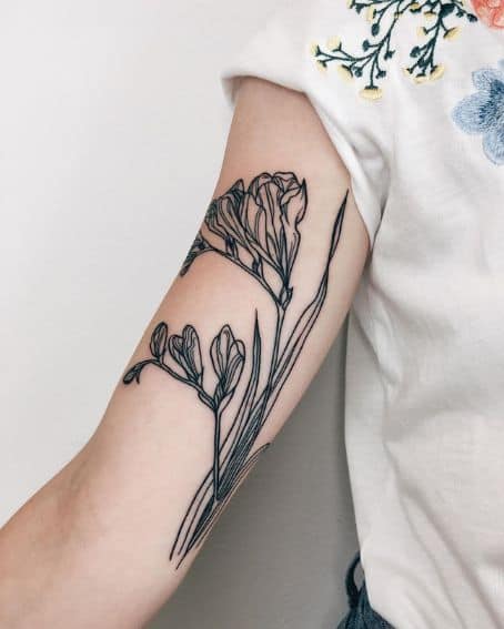 Delicate Freesia Flowers Tattoo on Arm