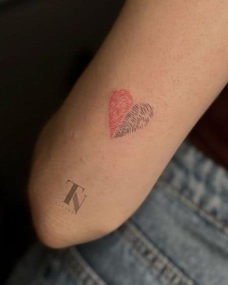 Dual-Colored Heart-Shaped Fingerprint Tattoo