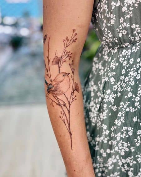 Fairywren and Ginkgo Leaves Tattoo on Elbow