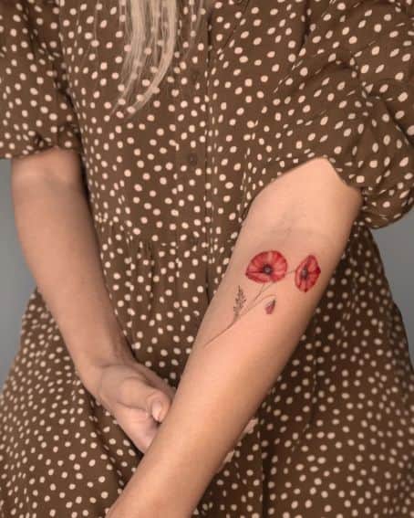 Fineline Poppy Flower Tattoo on Forearm