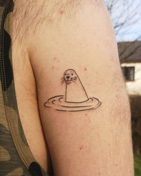 Fineline Seal Tattoo