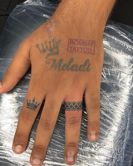 Finger Crown Tattoo