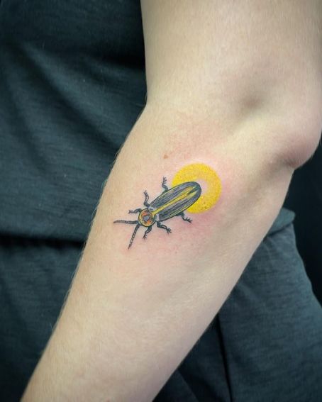 Firefly Tattoo with Yellow Light