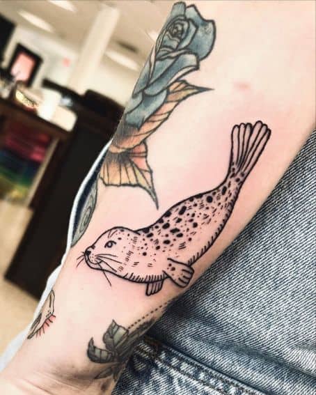 Floral Work Seal Tattoo