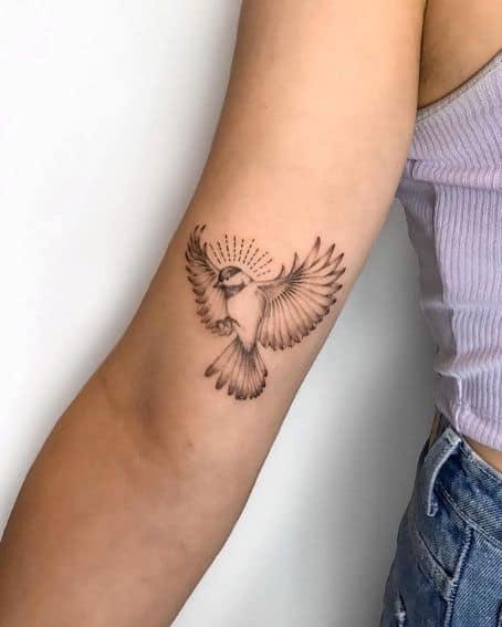 Flying Chickadee Tattoo on Inner Arm