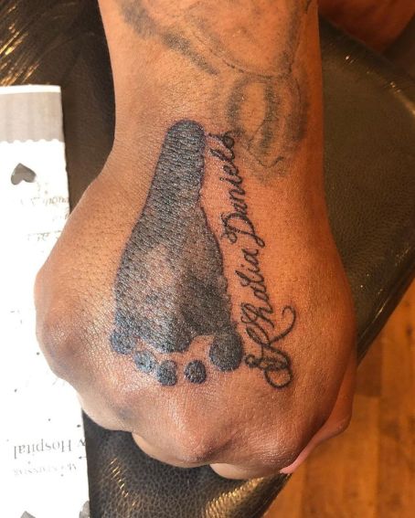 Footprint Tattoo on Back Hand