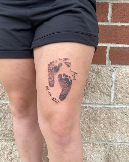 Footprint Tattoo on Thighs