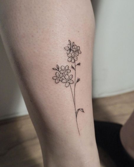 Forget Me Not Flower Tattoo on Leg