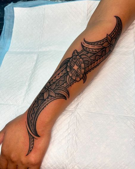 Fun Polynesian Forearm Tattoo Design