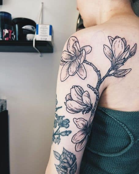 Gorgeous Branch of Magnolia Tattoo