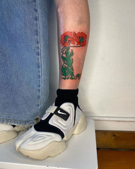 Grayce Poppy Flower Tattoo Design on Leg