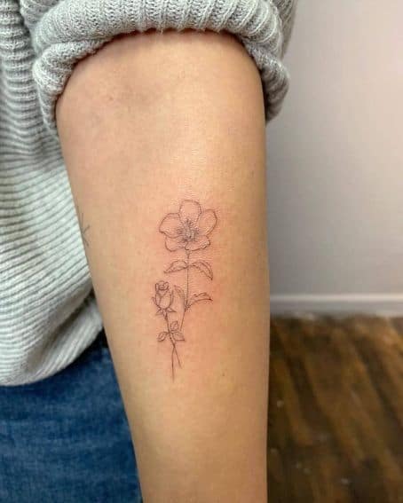 Hibiscus and Rose Tattoo on Arm