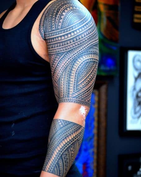 Intricate Polynesian tattoo design on arm