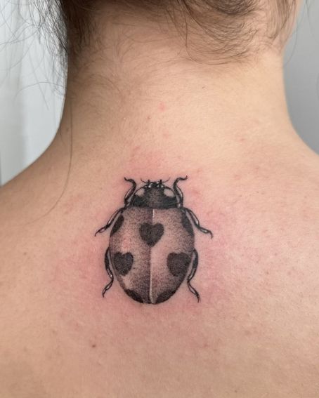 Ladybug Tattoo on Back
