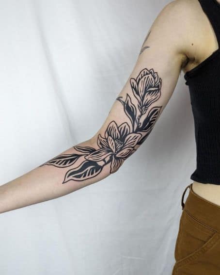 Large Black Magnolia Tattoo Design on Arm