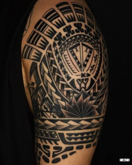 Large Polynesian tattoo on shoulder