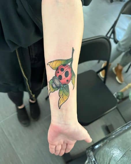 Little Ladybug Tattoo with Leaves