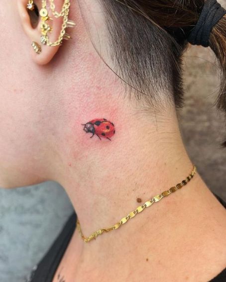 Lovely Little Ladybug Tattoo on Neck